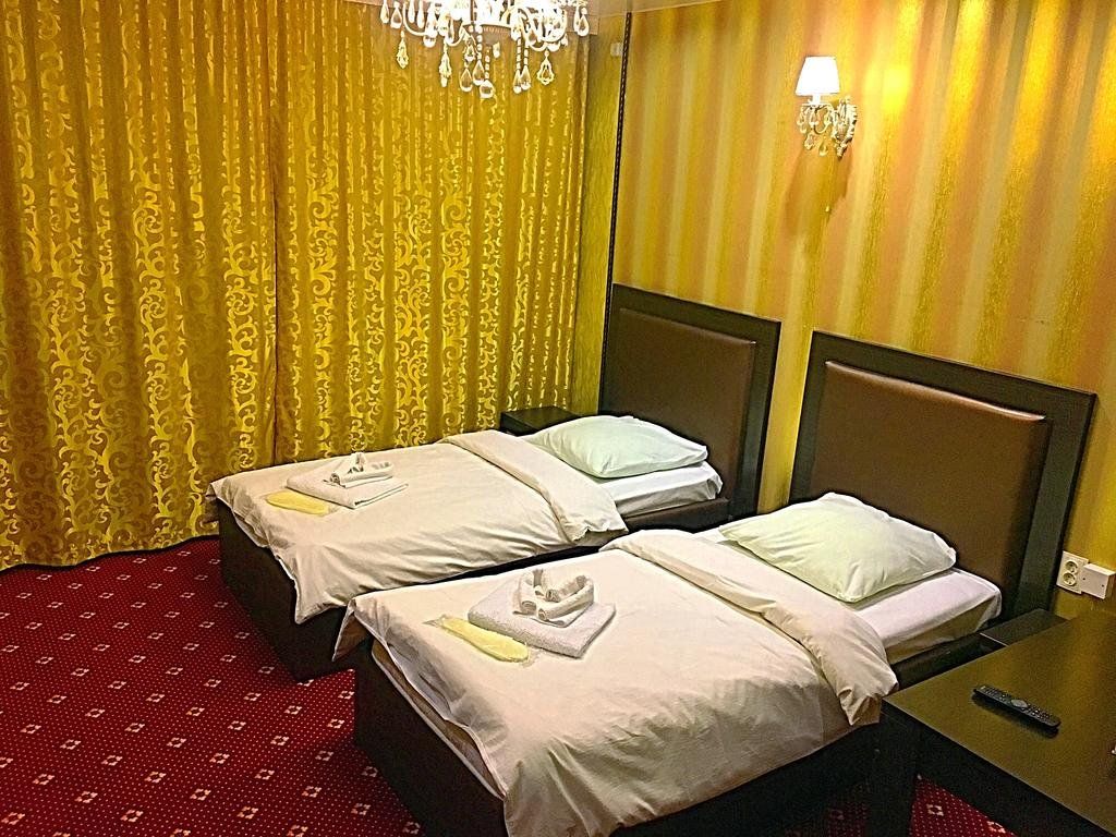 Двухместный номер с 2 отдельными кроватями стандарт