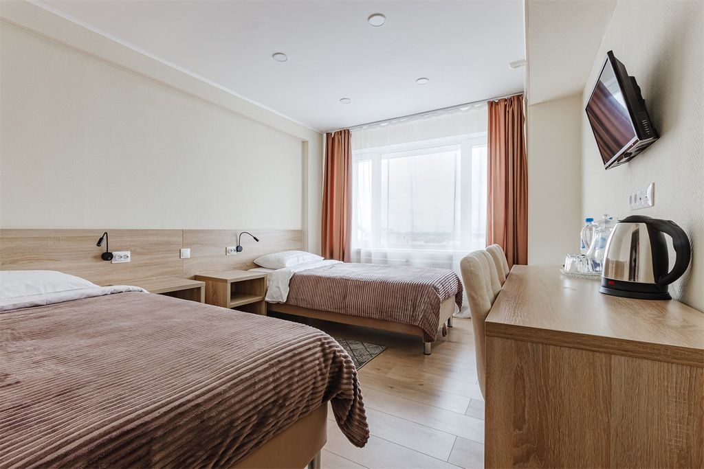 Двухместный номер с 2 отдельными кроватями комфорт