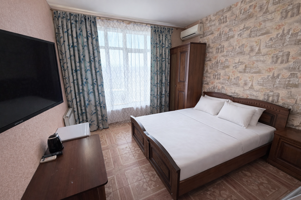 Четырёхместный номер улучшенный с видом на горы