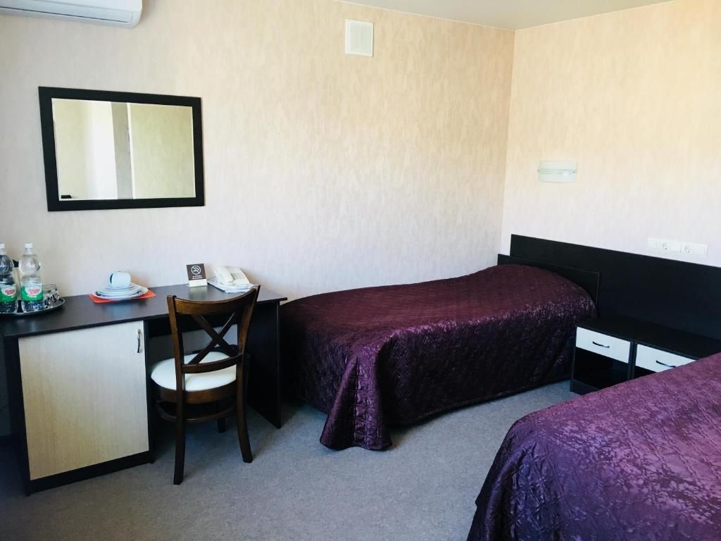 Двухместный номер с 2 отдельными кроватями комфорт улучшенный