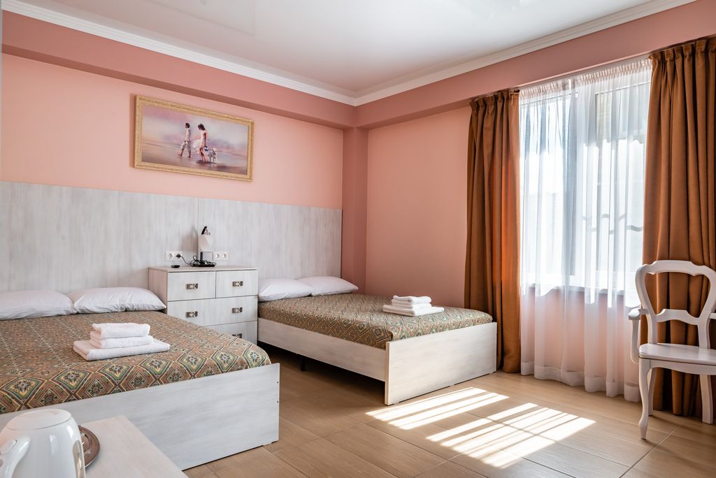 Двухместный номер с 2 отдельными кроватями улучшенный