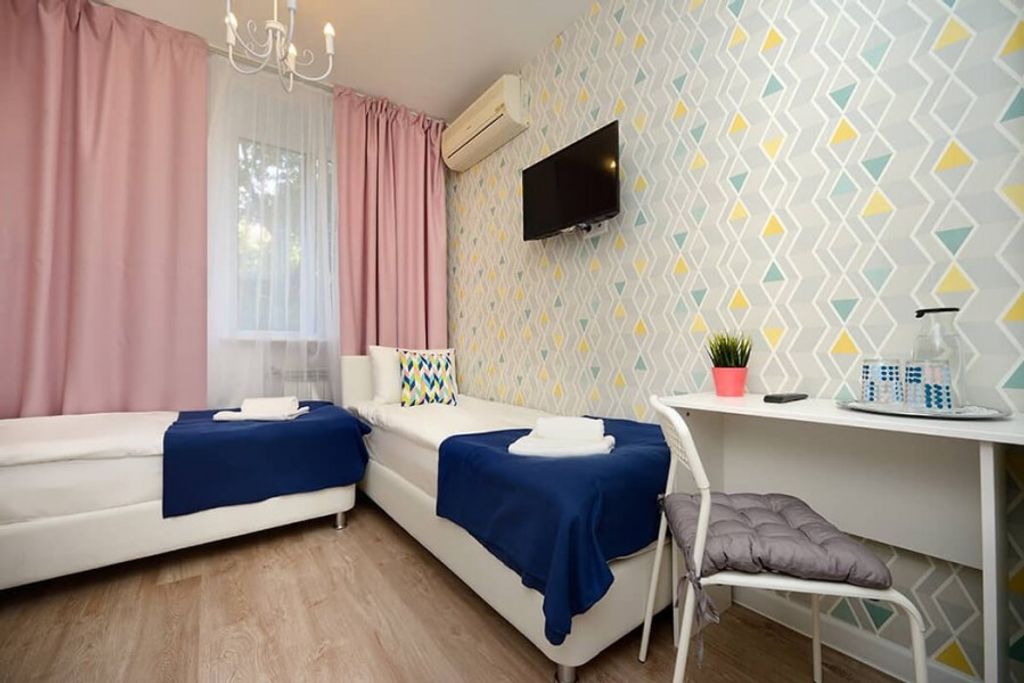 Двухместный номер с 2 отдельными кроватями улучшенный