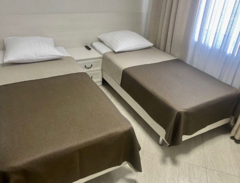 Двухместный номер с 2 отдельными кроватями стандарт