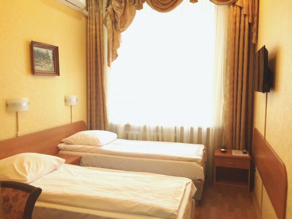 Двухместный номер с 2 отдельными кроватями стандарт