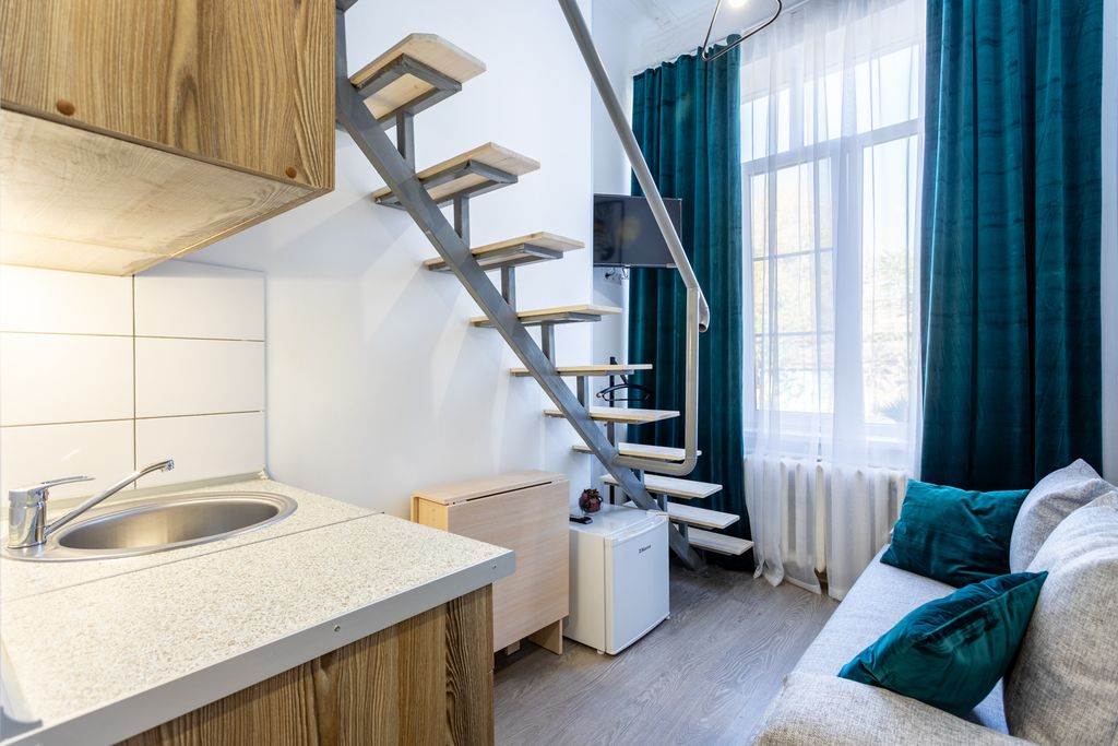 Трёхместный номер Двухуровневый номер студия.