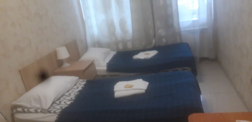 Двухместный номер с 2 отдельными кроватями улучшенный с видом на город