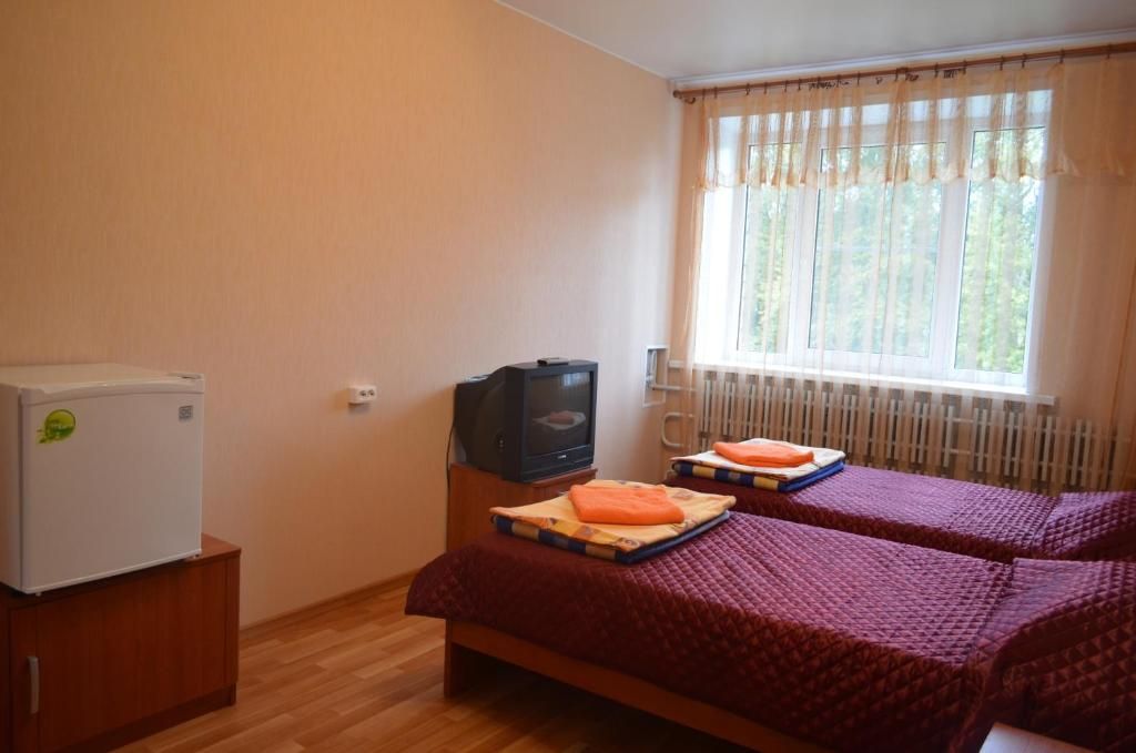 Двухместный номер с 2 отдельными кроватями стандарт в блоке