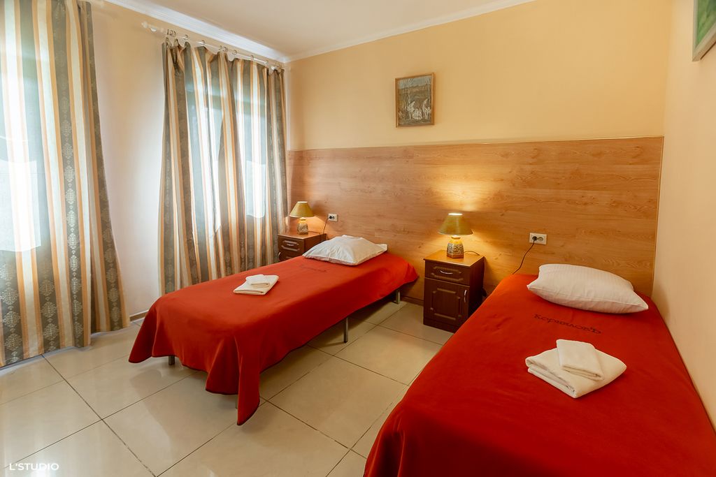 Двухместный номер с 2 отдельными кроватями стандарт