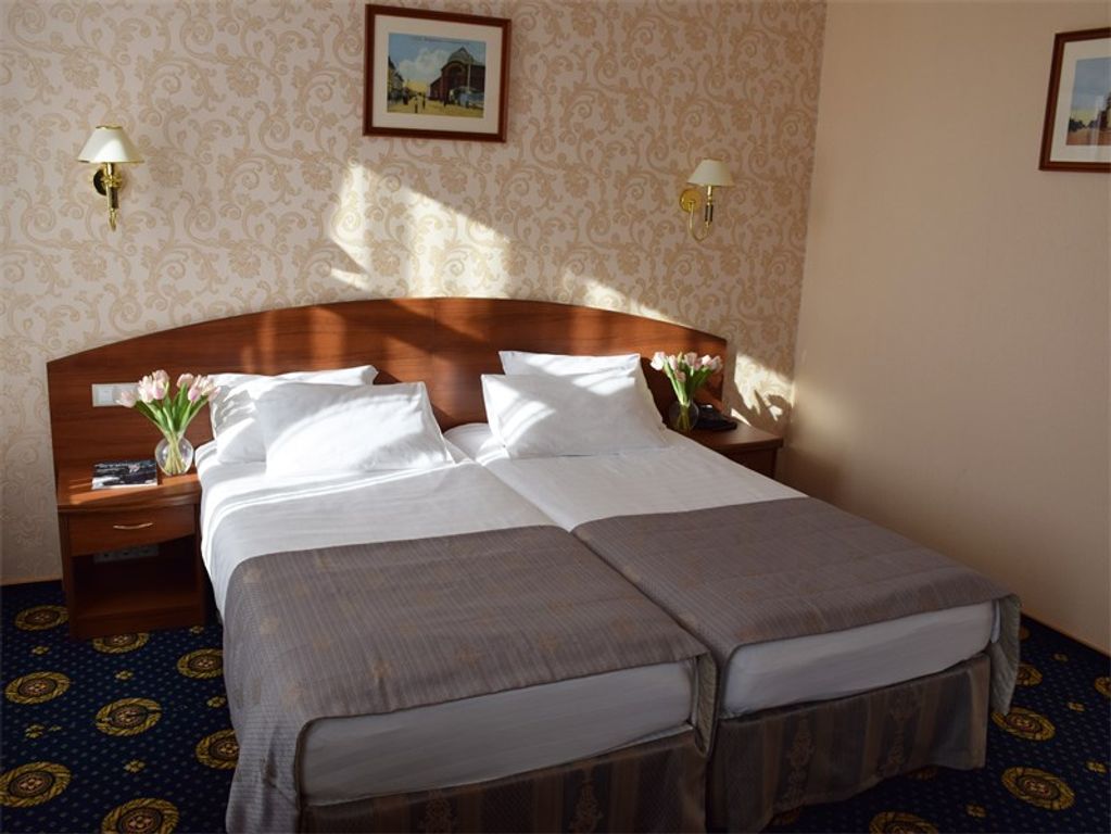 Двухместный номер с 2 отдельными кроватями стандарт