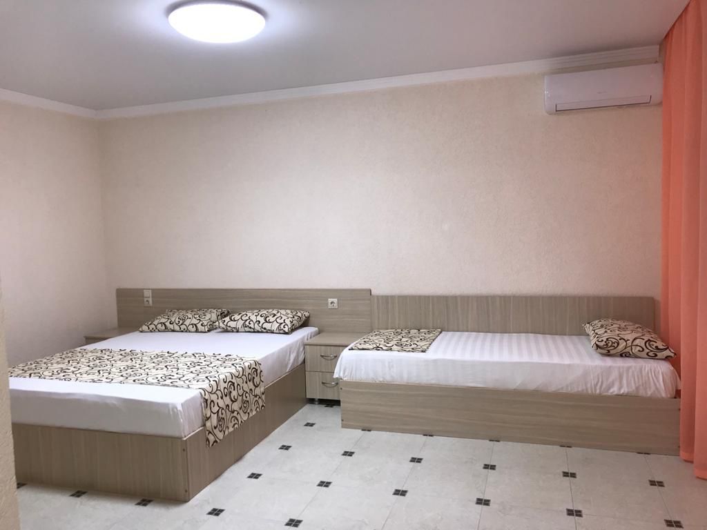 Трёхместный номер стандарт с балконом