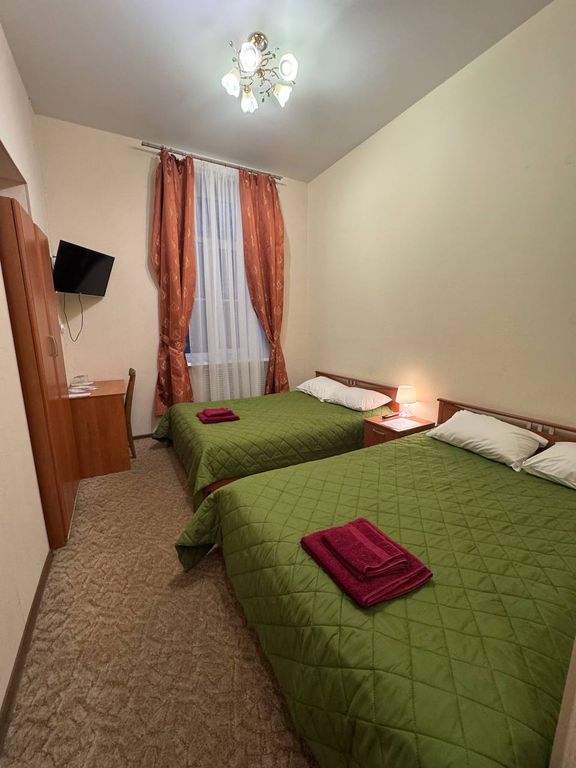 Двухместный номер с 2 отдельными кроватями улучшенный с видом на город