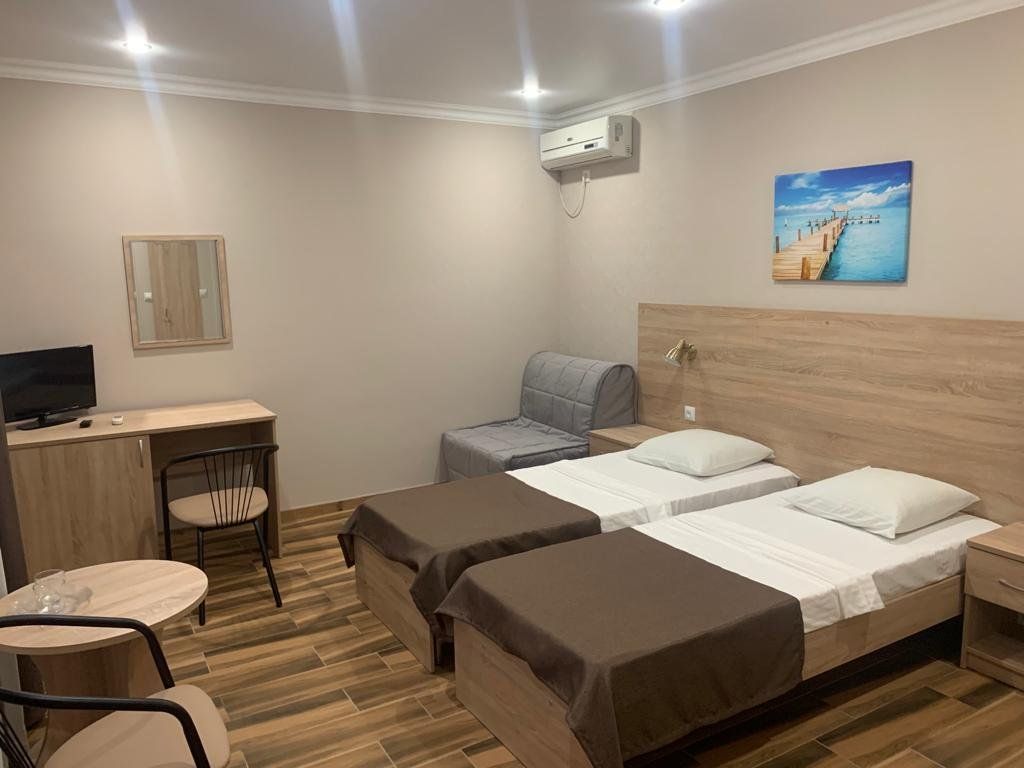 Трёхместный номер люкс