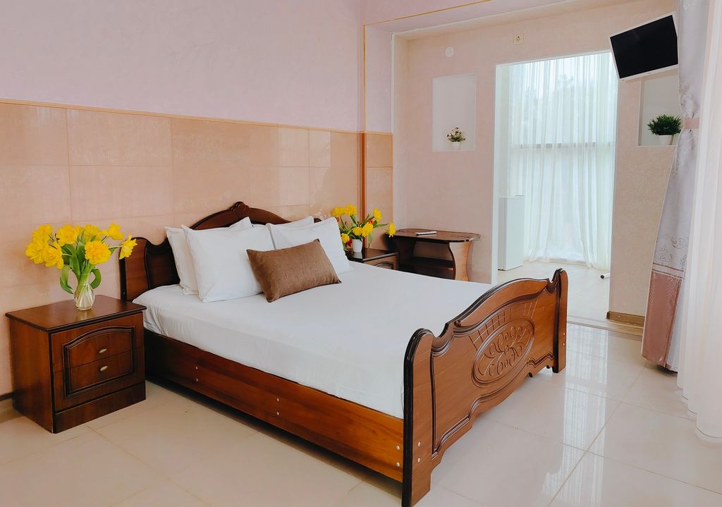 Четырёхместный номер полулюкс с панорамным видом на колесо обозрения