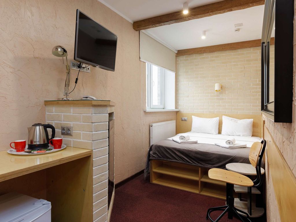 Двухместный номер с 1 кроватью стандарт улучшенный с камином и диваном