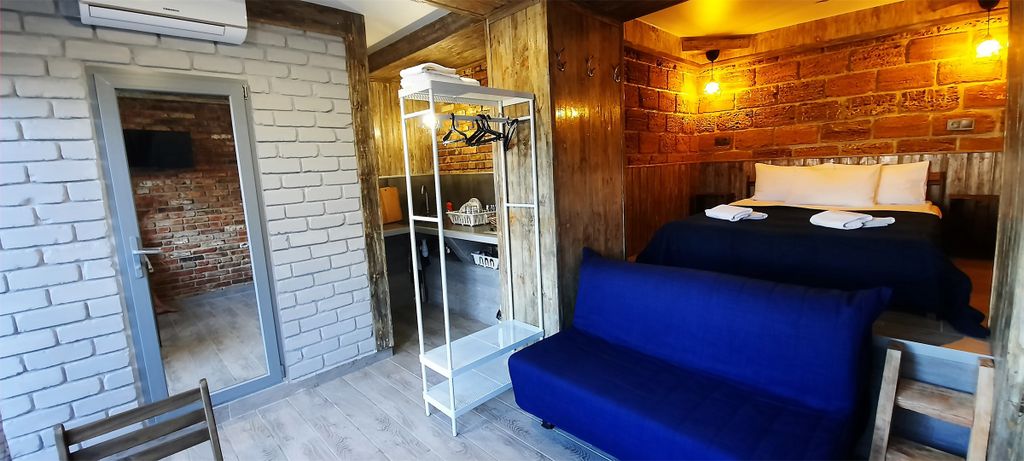 Четырёхместный номер студия с видом на сад