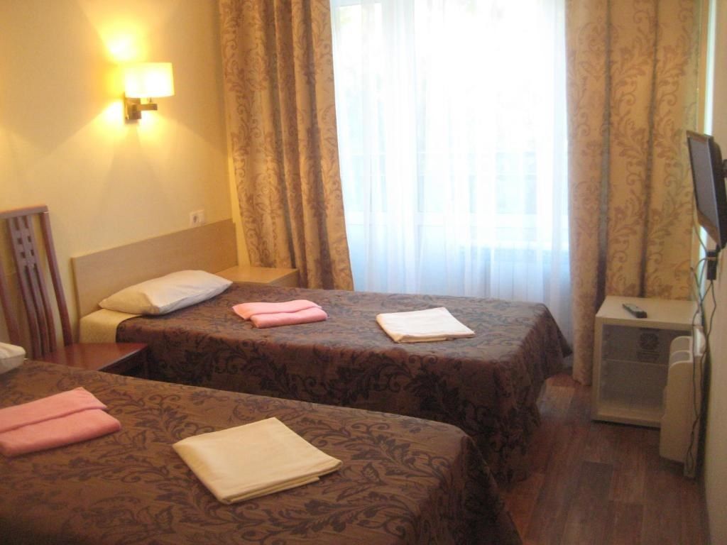 Двухместный номер с 2 отдельными кроватями эконом