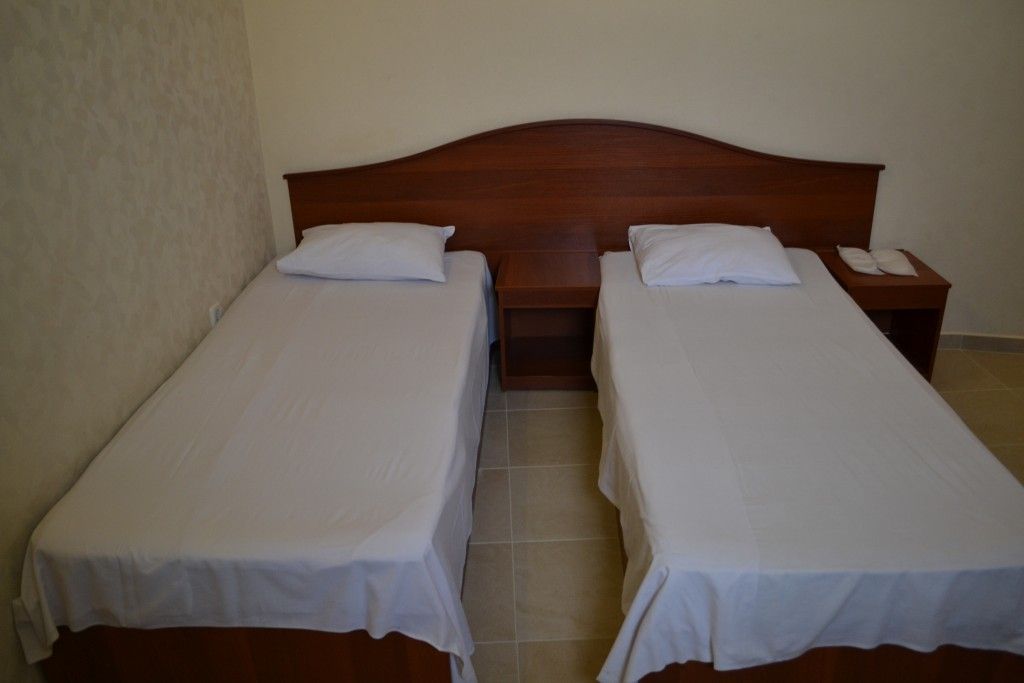 Двухместный номер с 2 отдельными кроватями стандарт