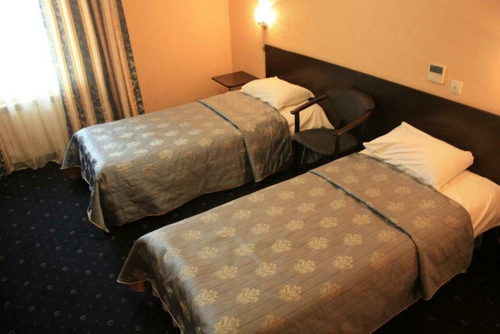 Двухместный номер с 2 отдельными кроватями стандарт