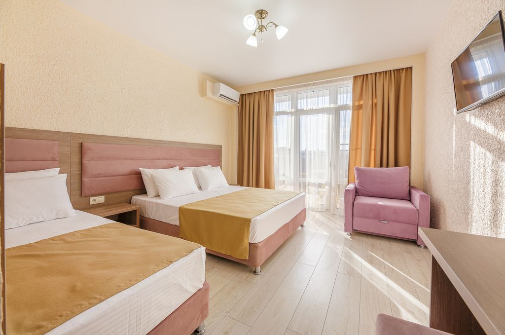 Трёхместный номер делюкс