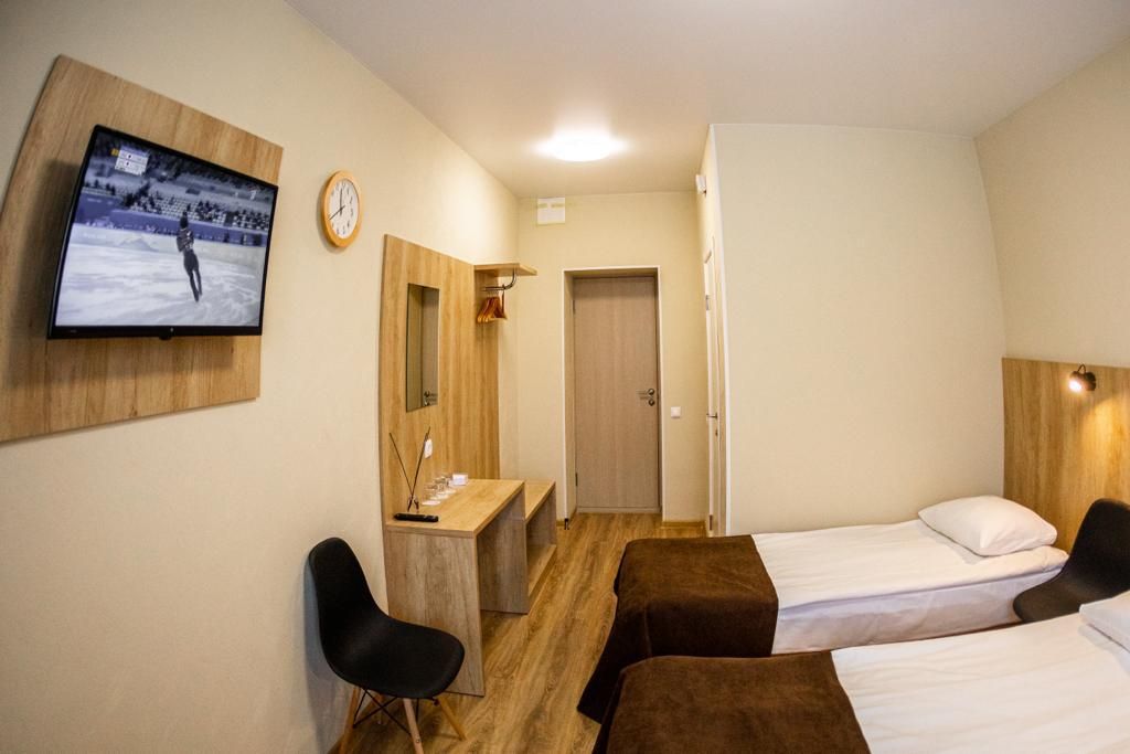 Двухместный номер с 2 отдельными кроватями улучшенный