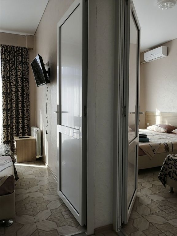 Семейный номер двухкомнатный улучшенный с 2мя балконами видом на горы