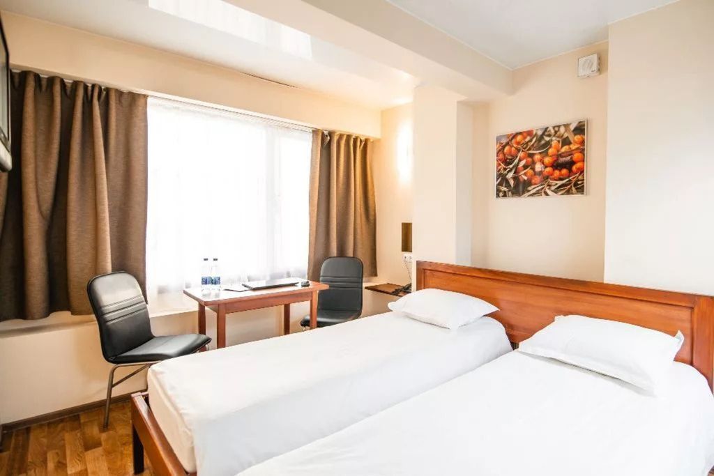 Двухместный номер с 2 отдельными кроватями Стандарт