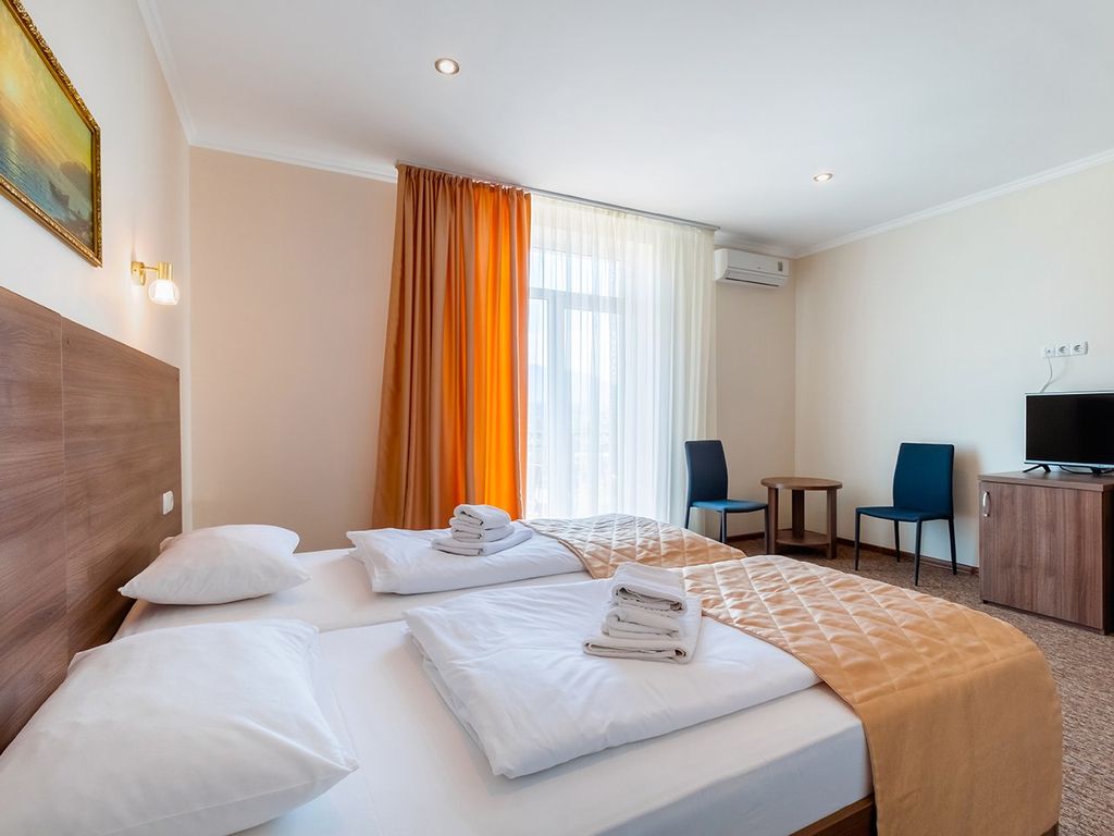 Двухместный номер с 2 отдельными кроватями полулюкс