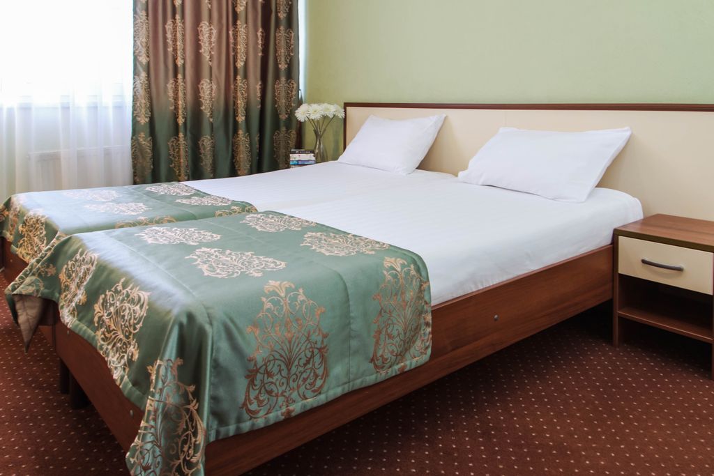 Двухместный номер с 2 отдельными кроватями стандарт