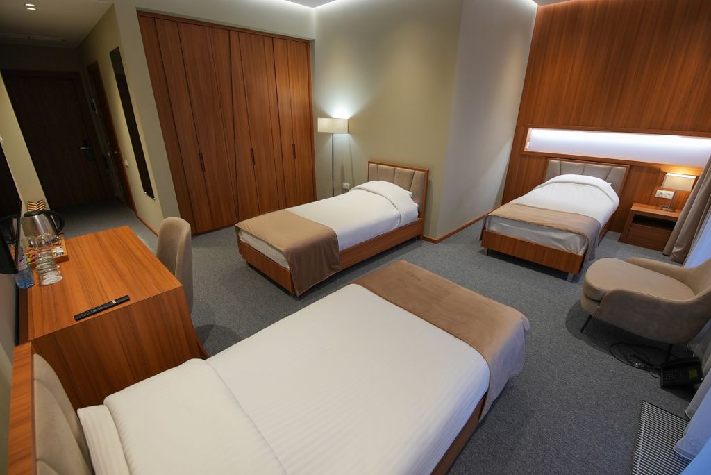 Трёхместный номер делюкс