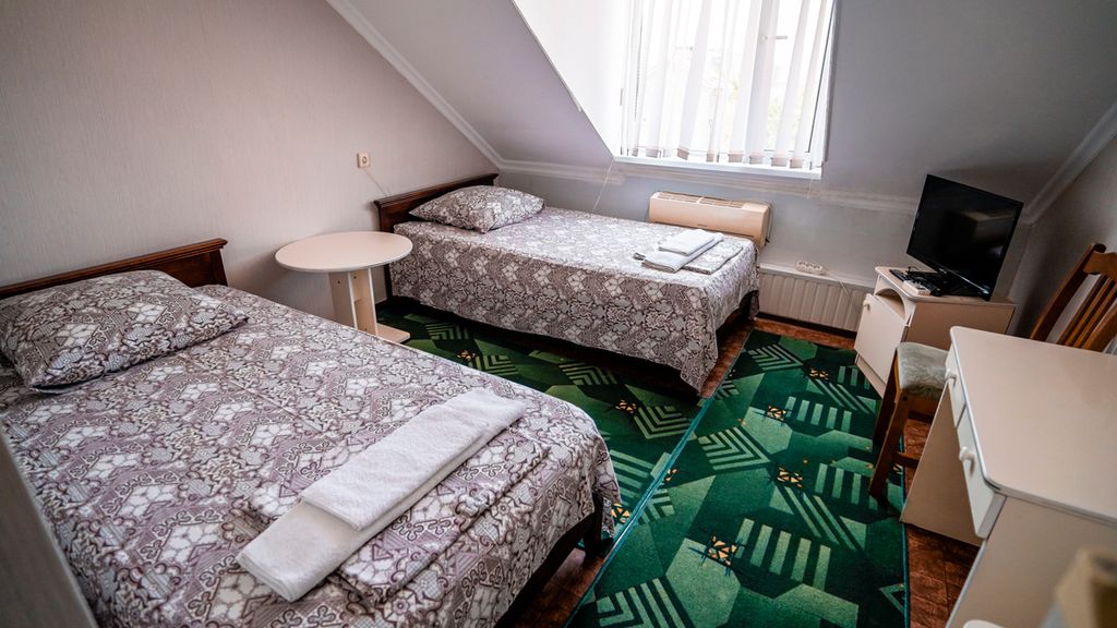 Двухместный номер с 2 отдельными кроватями стандарт