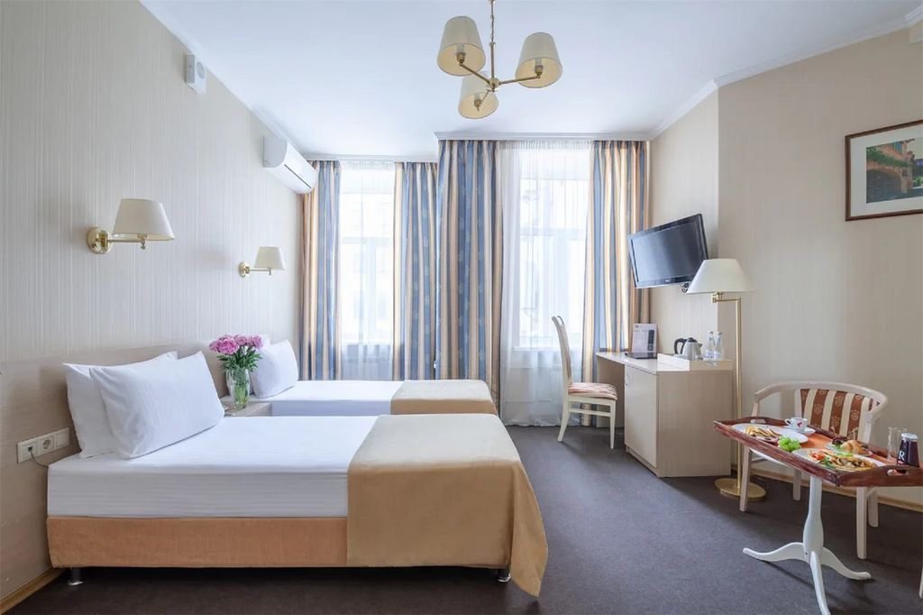 Двухместный номер с 1 кроватью или 2 отдельными кроватями полулюкс