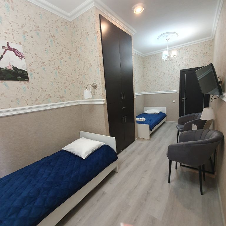 Двухместный номер с 2 отдельными кроватями Комфорт с односпальными кроватями