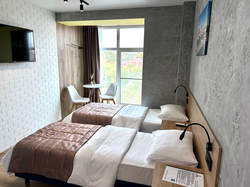 Двухместный с 2 отдельными кроватями Стандартный с двумя отдельными кроватями. Дизайн ЛОФТ. Вид на город