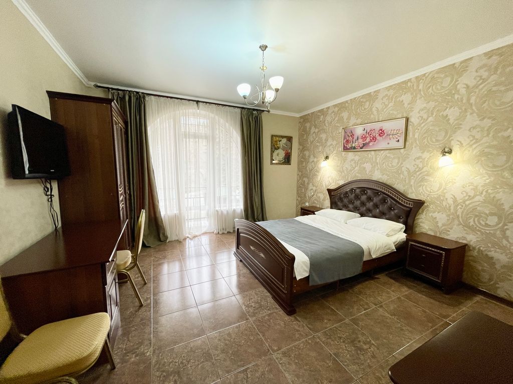 Трёхместный номер люкс