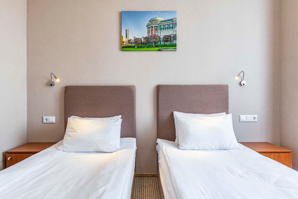 Двухместный номер с 2 отдельными кроватями улучшенный с видом на город