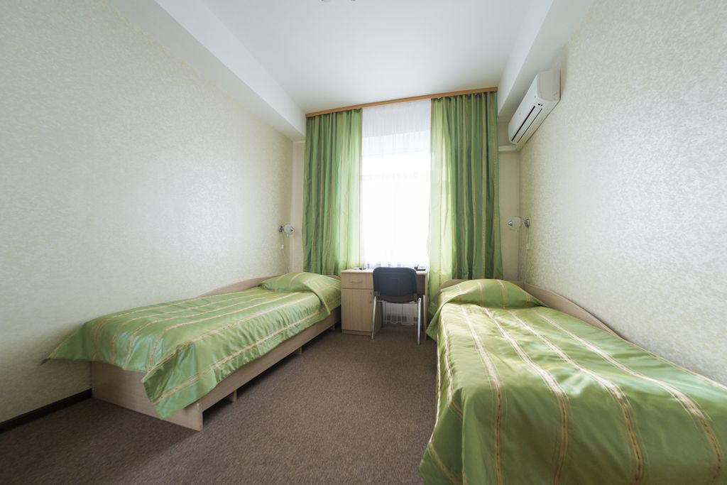 Двухместный номер с 2 отдельными кроватями стандарт
