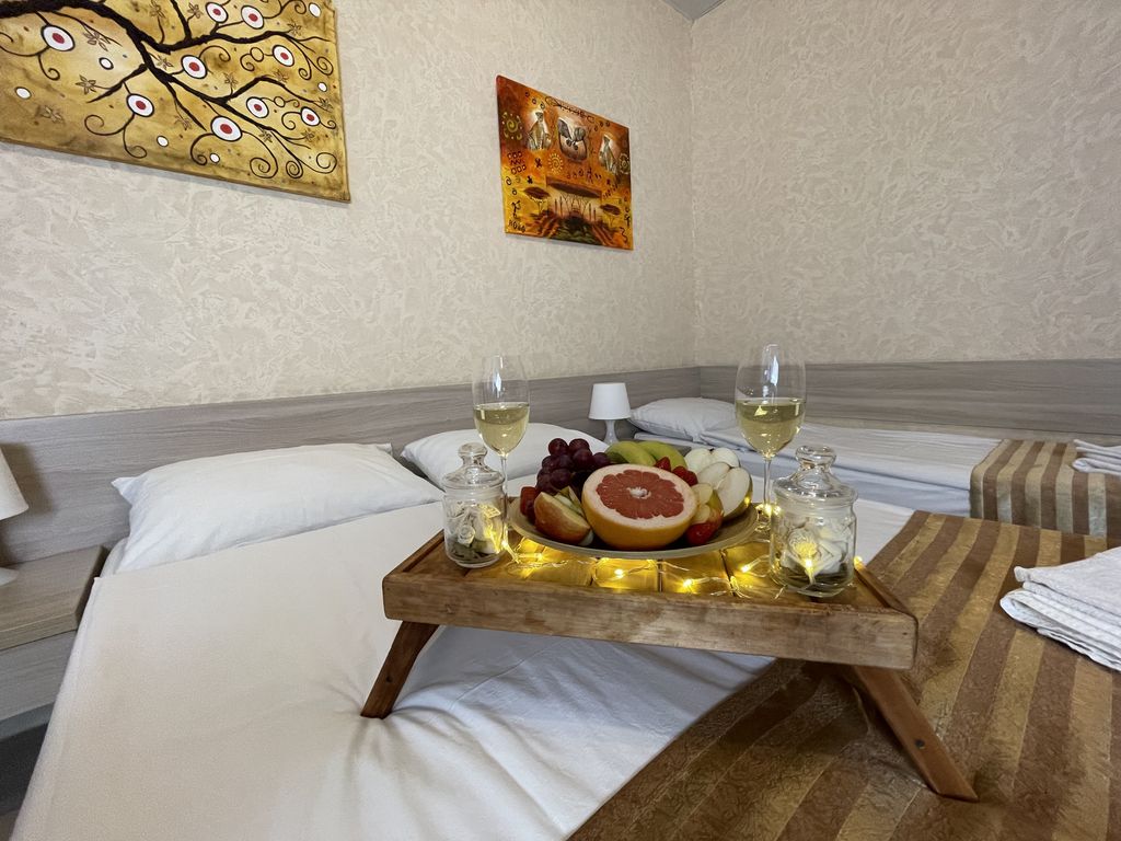 Трёхместный номер с выходом на террасу из номера