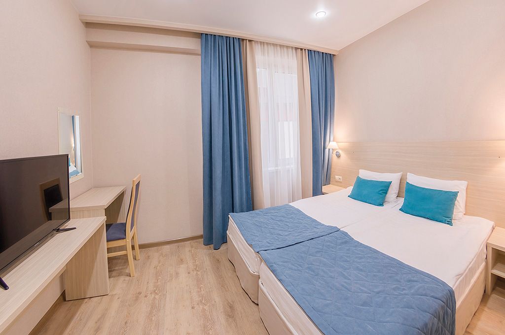 Двухместный номер с 2 отдельными кроватями стандарт