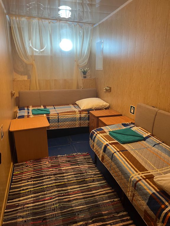 Двухместный номер с 2 отдельными кроватями эконом, каюта - нижняя палуба
