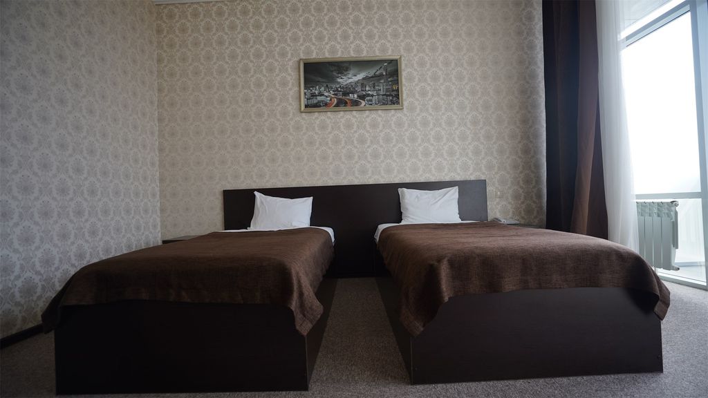 Двухместный номер с 2 отдельными кроватями стандарт