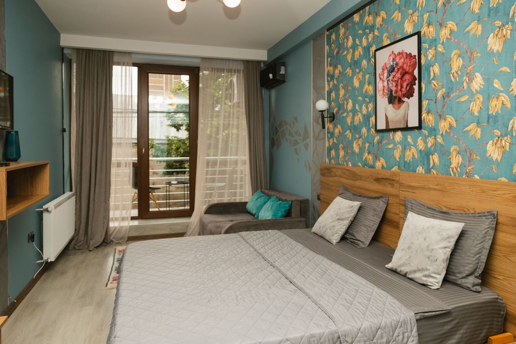 Двухместный номер с 2 отдельными кроватями или 1 большой кроватью, балконом с красивым видом