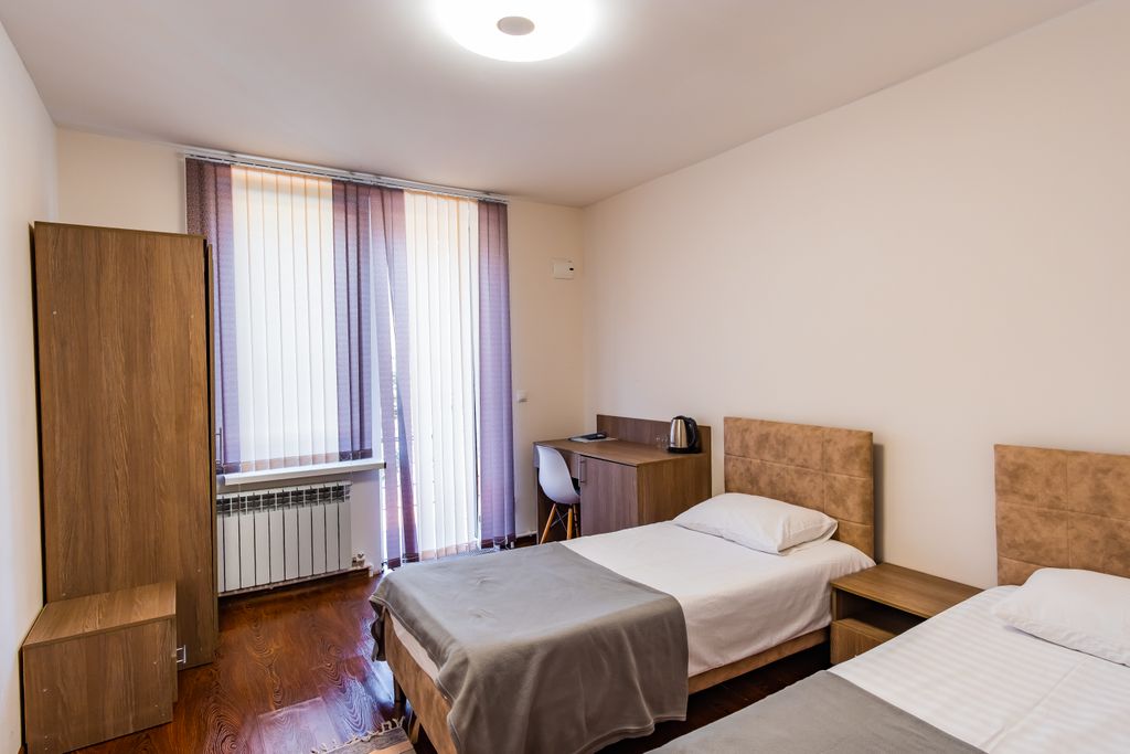 Двухместный номер с 2 отдельными кроватями улучшенный