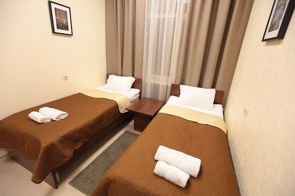 Двухместный номер с 2 отдельными кроватями Эконом, общий сан.узел