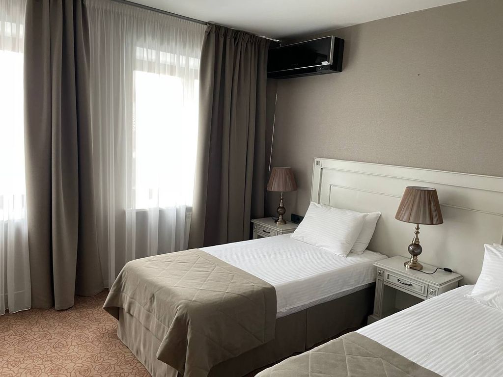 Двухместный номер с 2 отдельными кроватями стандарт