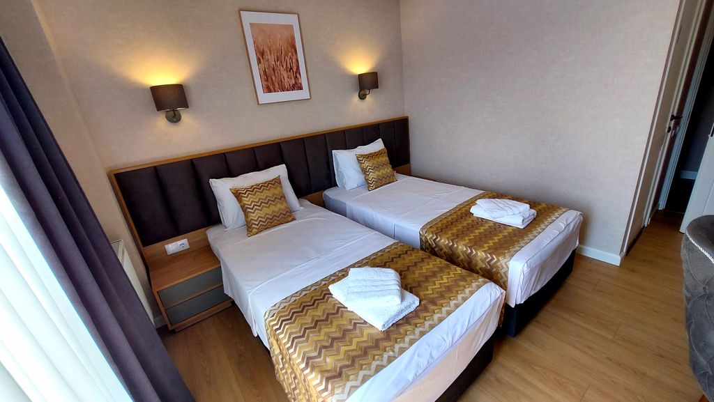 Двухместный номер с 2 отдельными кроватями стандарт