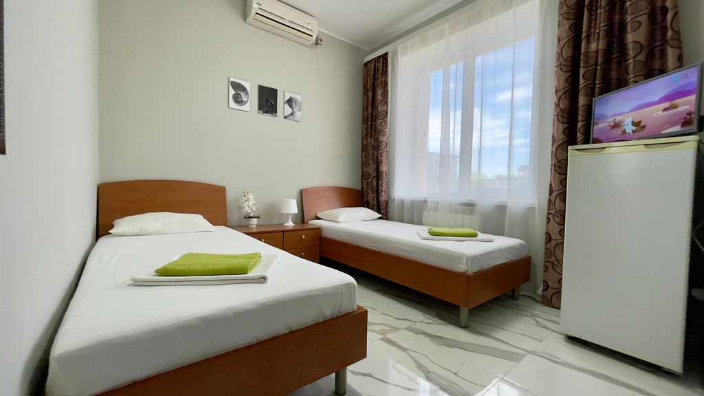 Двухместный номер с 2 отдельными кроватями стандарт