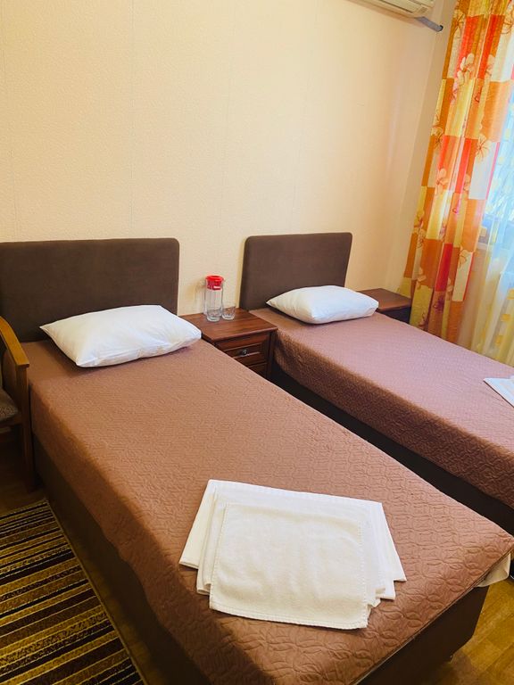 Двухместный номер с 2 отдельными кроватями стандарт