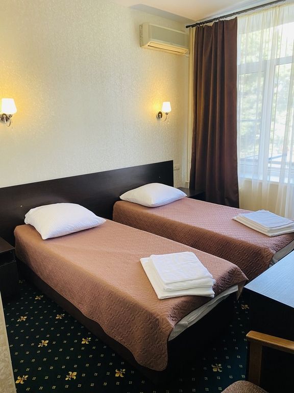 Двухместный номер с 2 отдельными кроватями улучшенный