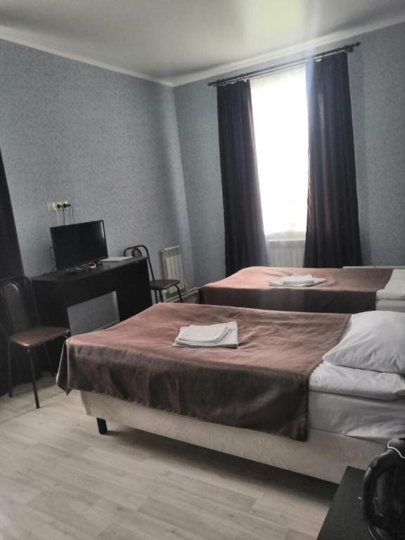 Двухместный номер с 2 отдельными кроватями Стандарт