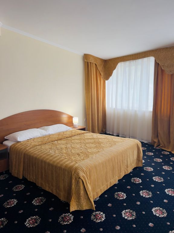 Семейный номер с винтовой лестницей